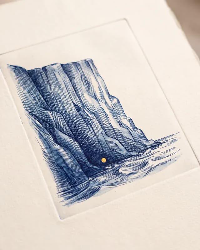 A blue ink etching of a rugged cliff above water with a single, small gold dot placed in a dark crevice near the shoreline.